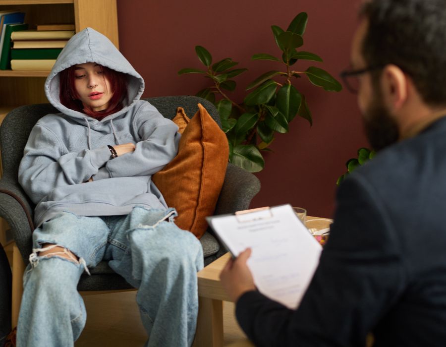 Young adult in therapy session.