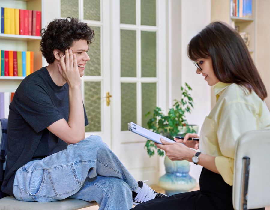 Young adults engaged in coaching session.