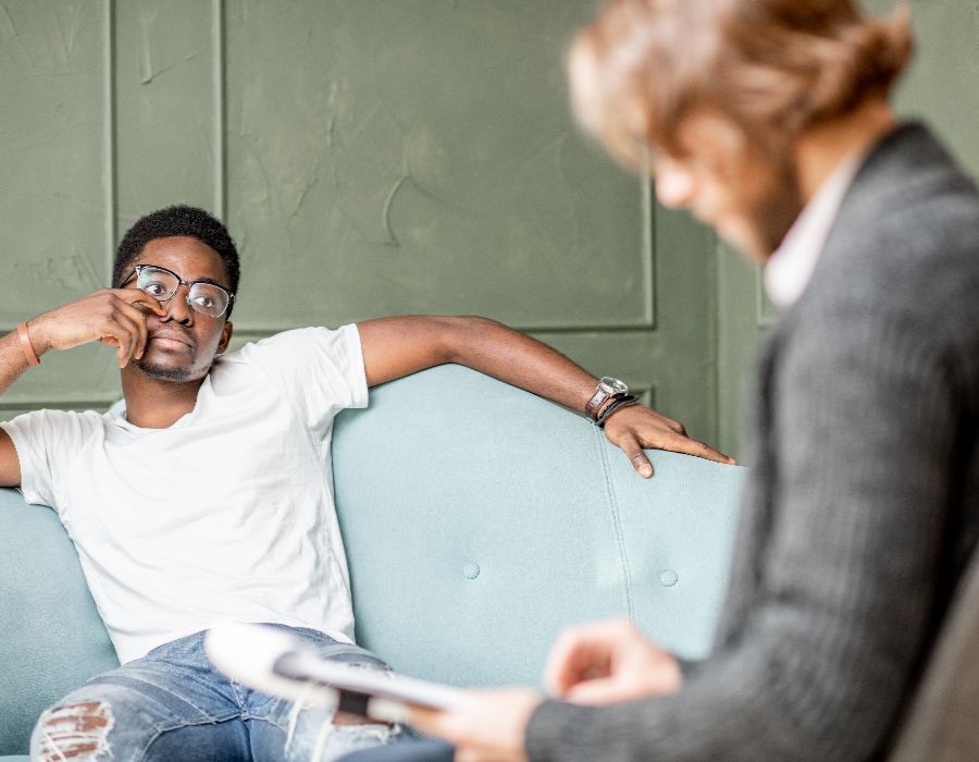 Two men in a counseling session.
