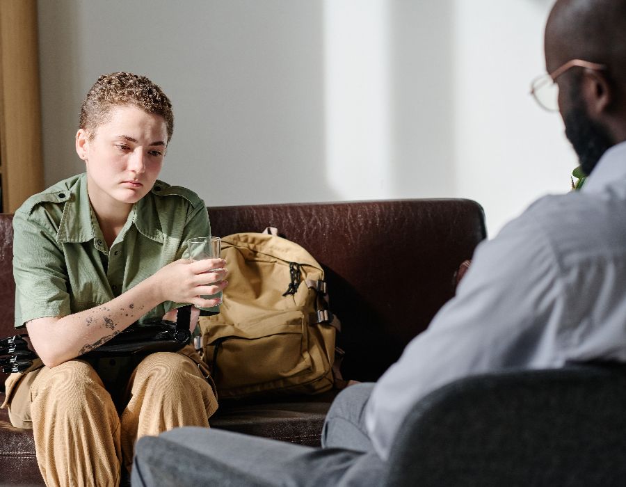 Young person in thoughtful conversation.